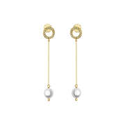Gold earrings with pearl drops on a white background